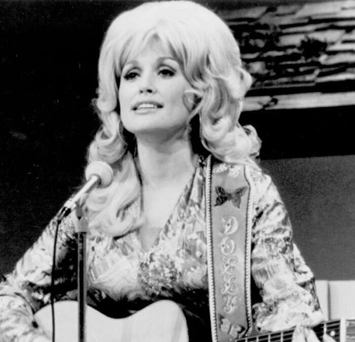 Dolly Parton Remembered as America's Girl, a Rare Icon of Grit and Grace