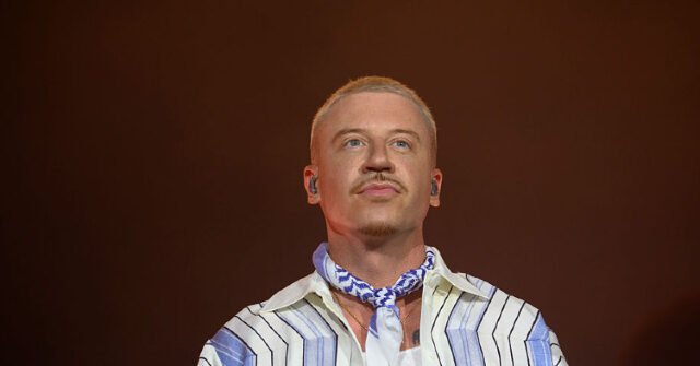 Macklemore Accuses Patriots Owner Robert Kraft of Blacklisting Him from Ed Sheeran Tour