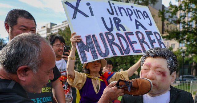 Hundreds Protest Xi Jinping Outside White House as State Dinner Rages Inside