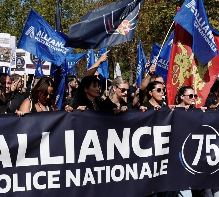 French Police Flood Paris Streets as Thousands March on National Assembly Over Stalled Pay